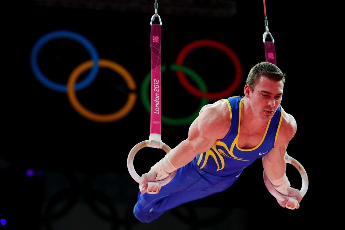 LONDON, ENGLAND - AUGUST 06: Arthur Nabarrete Zanetti of Brazil competes on the Artistic Gymnastics Men's Rings on Day 10 of the London 2012 Olympic Games at North Greenwich Arena on August 6, 2012 in London, England. (Photo by Ronald Martinez/Getty Images)